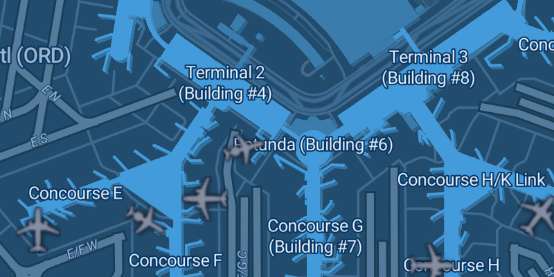 Screenshot of FlightAware map showing a close view of O'Hare with buildings visible and labeled