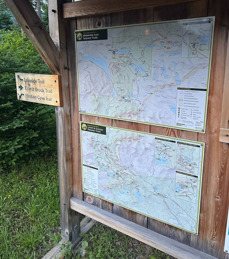 Photo of a kiosk with the trail maps